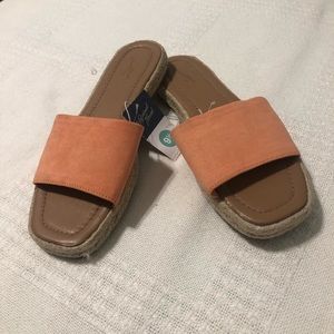 Beautiful woman's open toe platform sandals